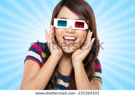 Teenager watching a 3D movie with retro 3D glasses