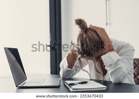 Stressed tired woman in pain having strong terrible headache attack after computer laptop study, fatigued exhausted girl suffering from chronic migraine massaging temples to relieve head ache tension Royalty-Free Stock Photo #2353670433