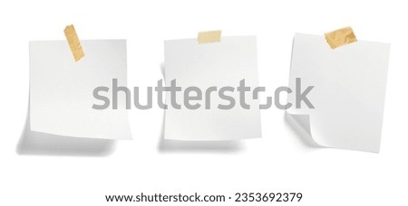 close up of  a note paper with adhesive tape on white background