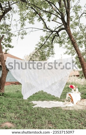 photo zone in the garden in a rustic style