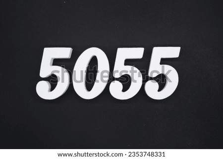 Black for the background. The number 5055 is made of white painted wood.