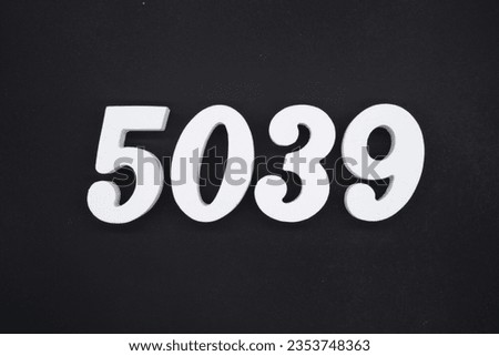 Black for the background. The number 5039 is made of white painted wood.