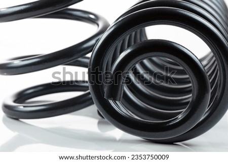 Heavy Duty Coil Springs for a truck on a white background. High quality photo Royalty-Free Stock Photo #2353750009