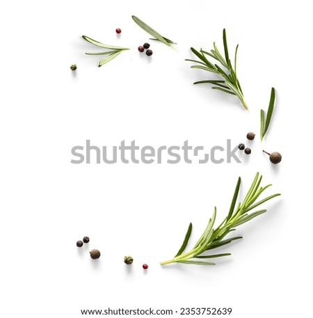 frame border Fresh green organic rosemary leaves and peper on white background.  Ingredient, spice for cooking. collection for design Royalty-Free Stock Photo #2353752639