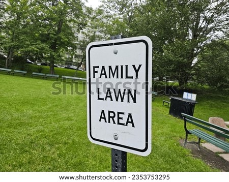 A sign that says family lawn area.