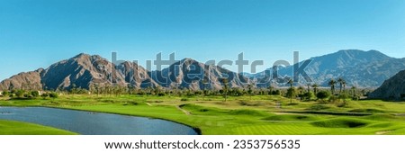 Golf course panorama in Palm Springs, California Royalty-Free Stock Photo #2353756535