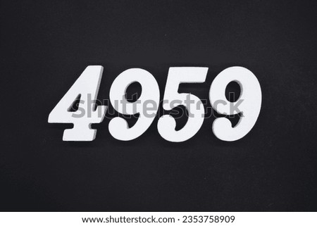 Black for the background. The number 4959 is made of white painted wood.