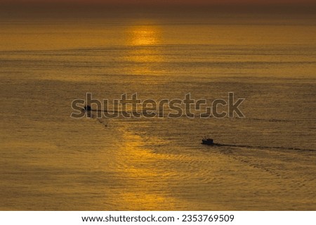 Amazing sunset time atmosphere blurred photo of the ocean landscape at golden hour. For wallpaper, screen saver, background, inspiration on copy space