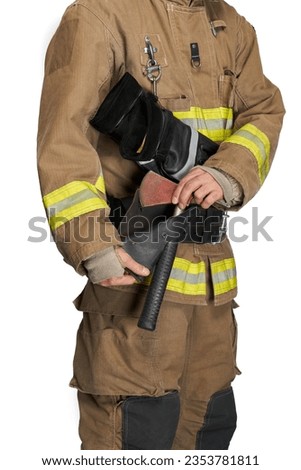 Anonymous male fireman pulling hammer from black leather holster. Crop view of firefighter in protective outfit, taking out fire tool for use, isolated on white studio background. Equipment concept.  Royalty-Free Stock Photo #2353781811