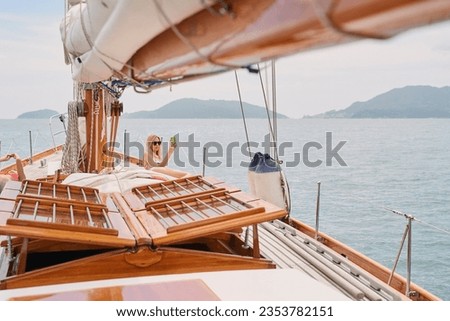 Travel, picture and women with phone on yacht relax for cruise on holiday, vacation and adventure at sea. Luxury sailing, boat and female person on smartphone for social media, online and selfie