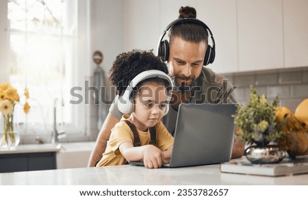 Father, child and laptop with headphones, home or happy for movie, music or streaming subscription. Dad, kid and computer for education, learning or help for online course in interracial family house
