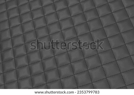 black leather surface with diamond texture