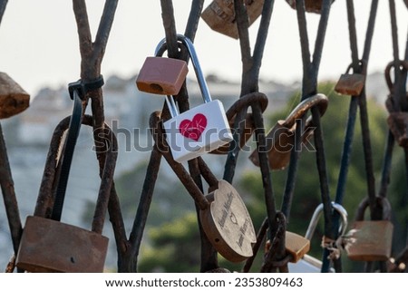 Padlocks tied to the bridge. Romantic scenes, symbol of love. Padlock to seal a bond of love. Lovers leave an eternal memory. Eternal love. The game of love.