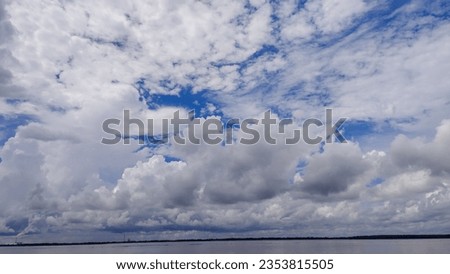 A beautiful picture river blue sky and white clouds