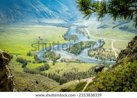 Summer landscape with rock formations Stone mushrooms in Chulyshman river valley, Altai mountains, Siberia, Russia Royalty-Free Stock Photo #2353838339