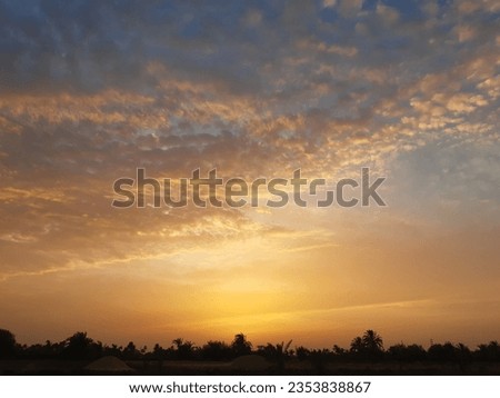 A picture of the sky from an agricultural land at sunset in Egypt 
