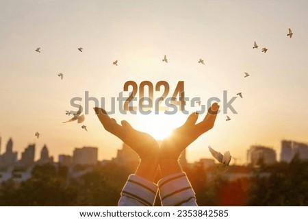 Concept of New Year 2024 with hopes for peace and prosperity. Royalty-Free Stock Photo #2353842585