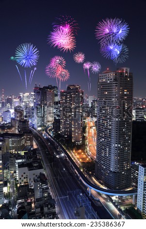 Fireworks celebrating over Tokyo cityscape at night of Japan