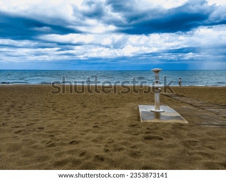 Sandy beach with blue skies and white clouds Beach before a storm.