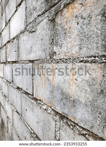 This adobe stone consisting of cement and sand is used to build the walls and foundations of houses Royalty-Free Stock Photo #2353933255