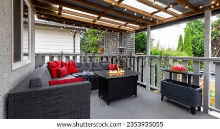 red deck patio with firepit