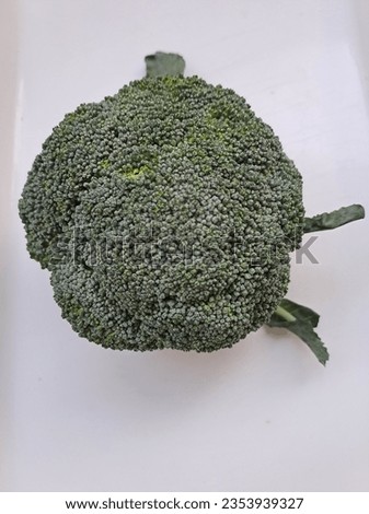 Green Broccoli Photo From Above. Broccoli is a cruciferous vegetable rich in antioxidants and other beneficial plant compounds
