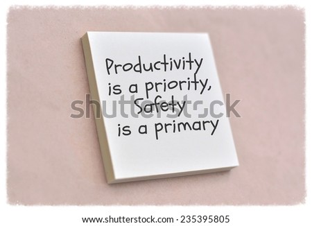 Text productivity is a priority safety is a primary on the short note texture background
