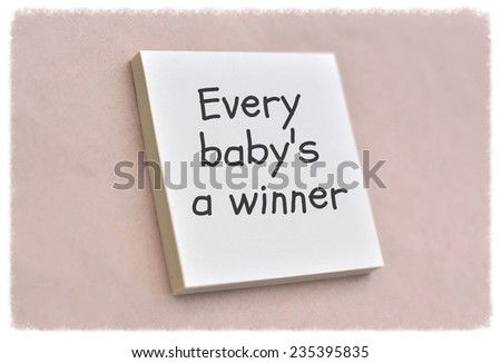 Text every baby's a winner on the short note texture background