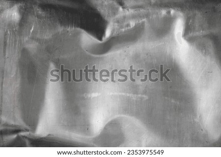Crumpled and scratched metal grunge metal texture and background Royalty-Free Stock Photo #2353975549