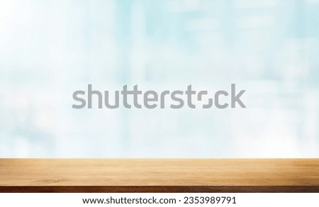 Beautiful Empty Wooden Table Top with Blurred Glass Window