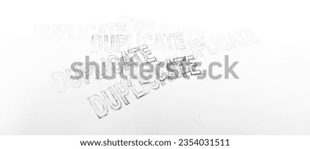 DUPLICATE rubber stamp over a white background. Royalty-Free Stock Photo #2354031511