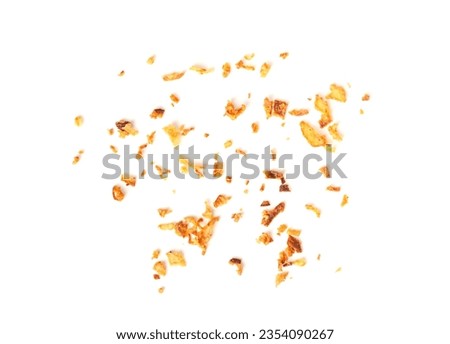 Roasted Onion Isolated, Scattered Dry Onion Pieces, Bulb Chips, Deep Fried Vegetable, Caramelized Shallot Sprinkles, Crispy Fried Onions on White Background Royalty-Free Stock Photo #2354090267