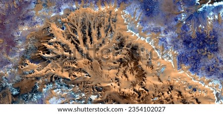   abstract landscape photo of the deserts of Africa from the air emulating the mud of life