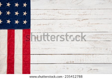 white wooden background with an American flag