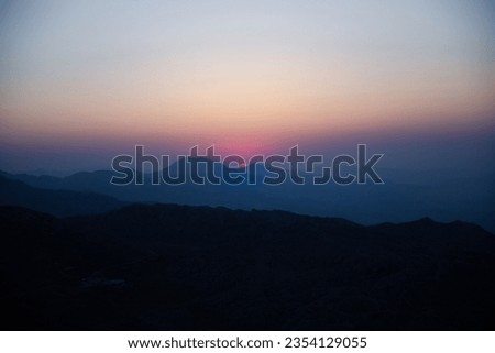 Sunrise view between mountain. At dawn on mount Nemrut.
