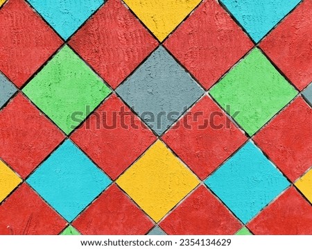 a wall with a colorful rhombus shape in the photo from the front