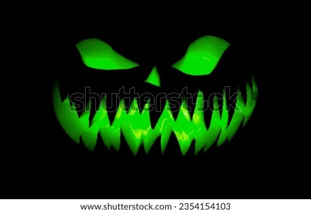Logo of a scary illuminated pumpkin for Halloween.
Trick or treat?