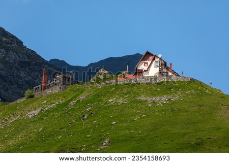 A mountain hut in the carpathian mountains of romania Royalty-Free Stock Photo #2354158693