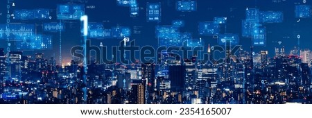 Modern city night view and digital communication network concept. Wide angle visual for banners or advertisements. Royalty-Free Stock Photo #2354165007