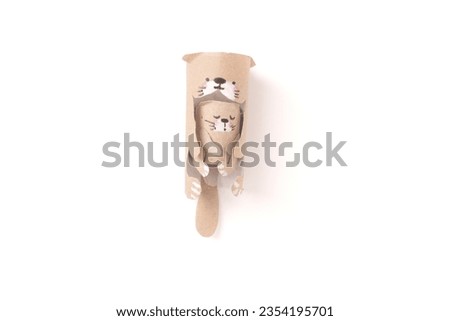mother and kid of otter animals made out of toilet paper, conceptual art, DIY recycling hack simple paper decoration in minutes, cute otter, brown paper, fan art, motherly, toy from waste material, 