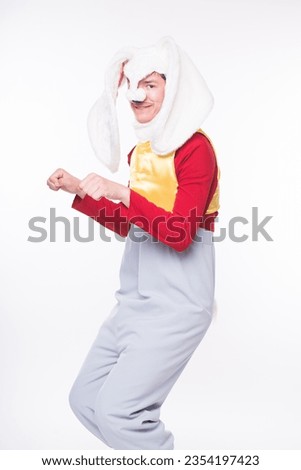 Man in white rabbit costume, Alice in Wonderland