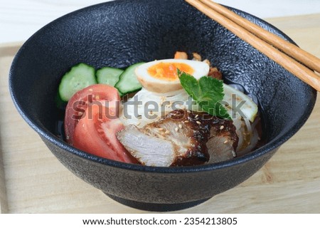 Morioka Reimen is a local cuisine of Morioka, Iwate Prefecture. It is known for its chewy noodles, rich chilled broth, and toppings of Kim Chi. It is based on Naengmyeon from Korea.