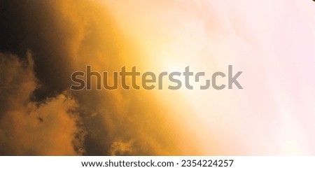 Beautiful colorful dramatic sky with clouds at sunset or sunrise.

