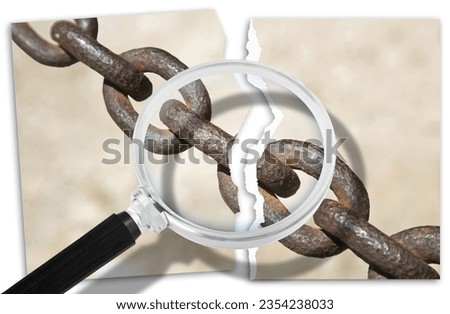 Look for the reasons for relationship break-ups - breaking the chains - Focus concept with a ripped photo of an old rusty metal chain seen through a magnifying glass