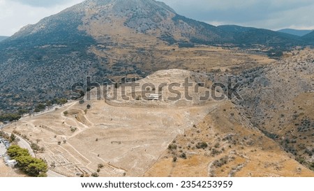 Mycenae, Greece. Excavation site: Greek settlement of the 12th century BC. e. with the ruins of the acropolis, palace and tombs, Aerial View  
