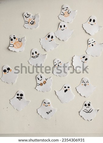 Happy Halloween. Cute little ghosts. Cut out little ghosts for decoration. Boo