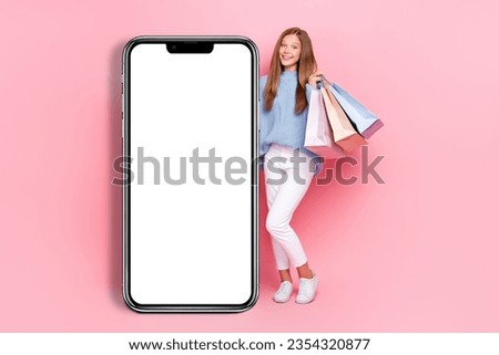 Full body size photo of young teenage girl shopaholic hold packages from boutique shopping mall empty space isolated on pink color background