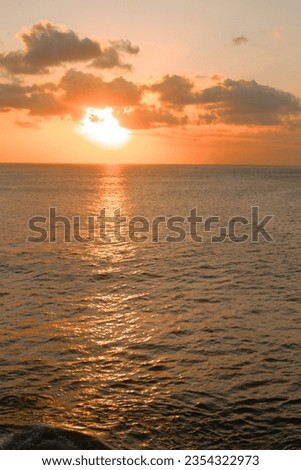 Beautiful view of the warm sunset and the Indian Ocean