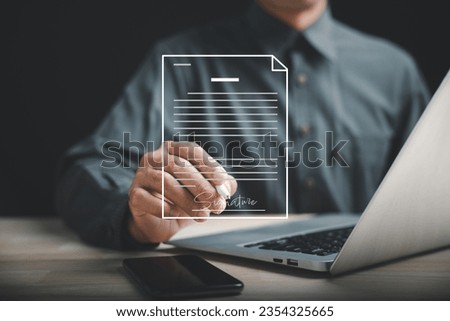 Digital technology enables businessman to sign online business contract with electronic signature. Showcases e-signing, digital document management, and paperless office. Agreement is established. Royalty-Free Stock Photo #2354325665