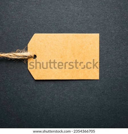 recyclable price tag on black background